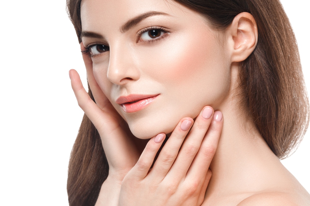 Woman has sleek cheek contours that complement her facial structure